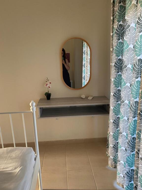 Postel nebo postele na pokoji v ubytování Aelia Villa