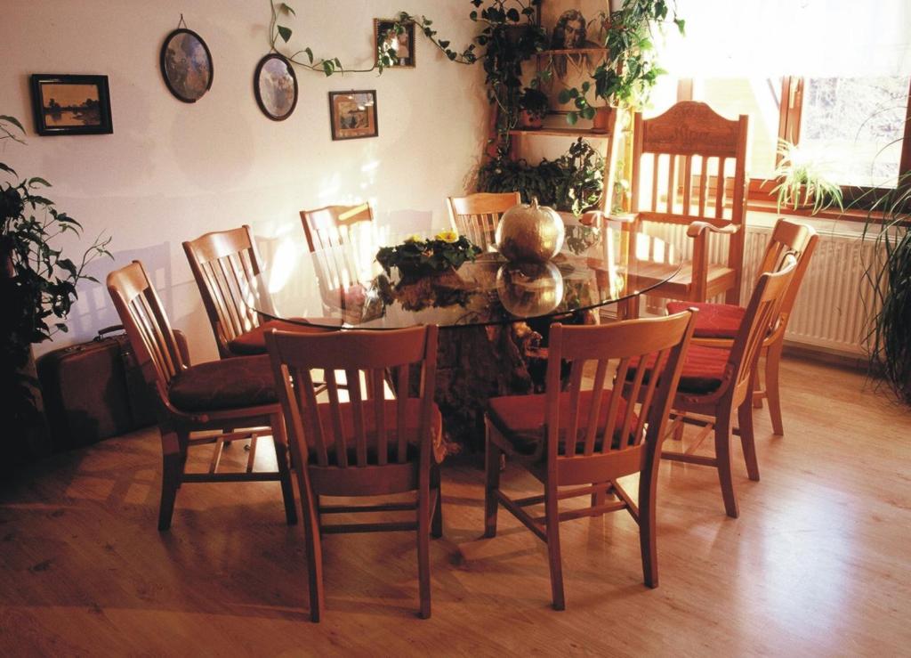 a dining room with a table and chairs at Turisticna Kmetija Pudvoi in Bizeljsko
