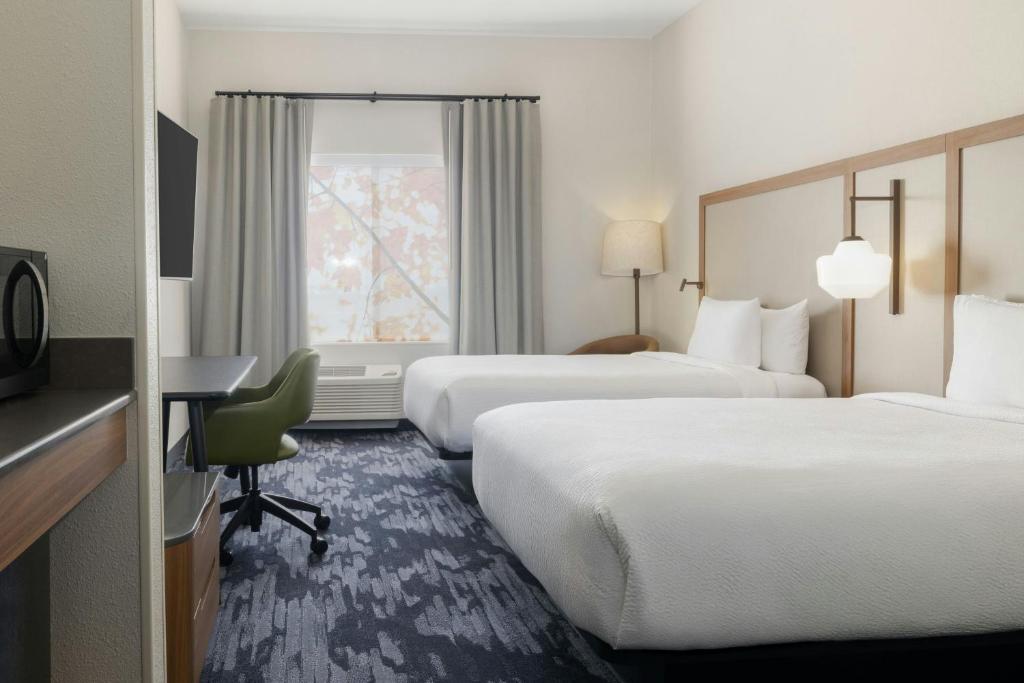 Postel nebo postele na pokoji v ubytování Fairfield by Marriott Inn & Suites Spokane Airport