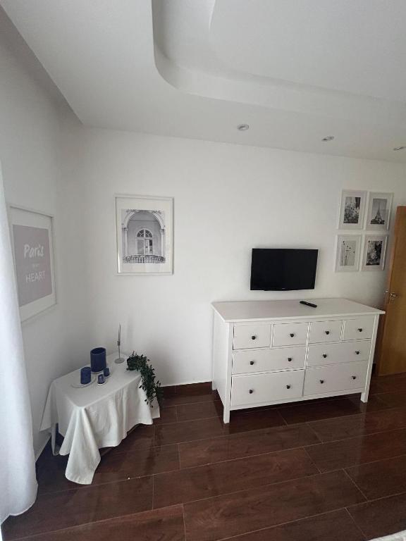 TV a/nebo společenská místnost v ubytování O' appartement Alhoceima
