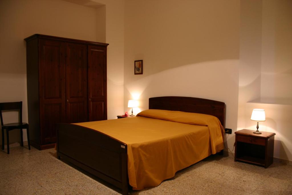 Postel nebo postele na pokoji v ubytování Agriturismo Simonello