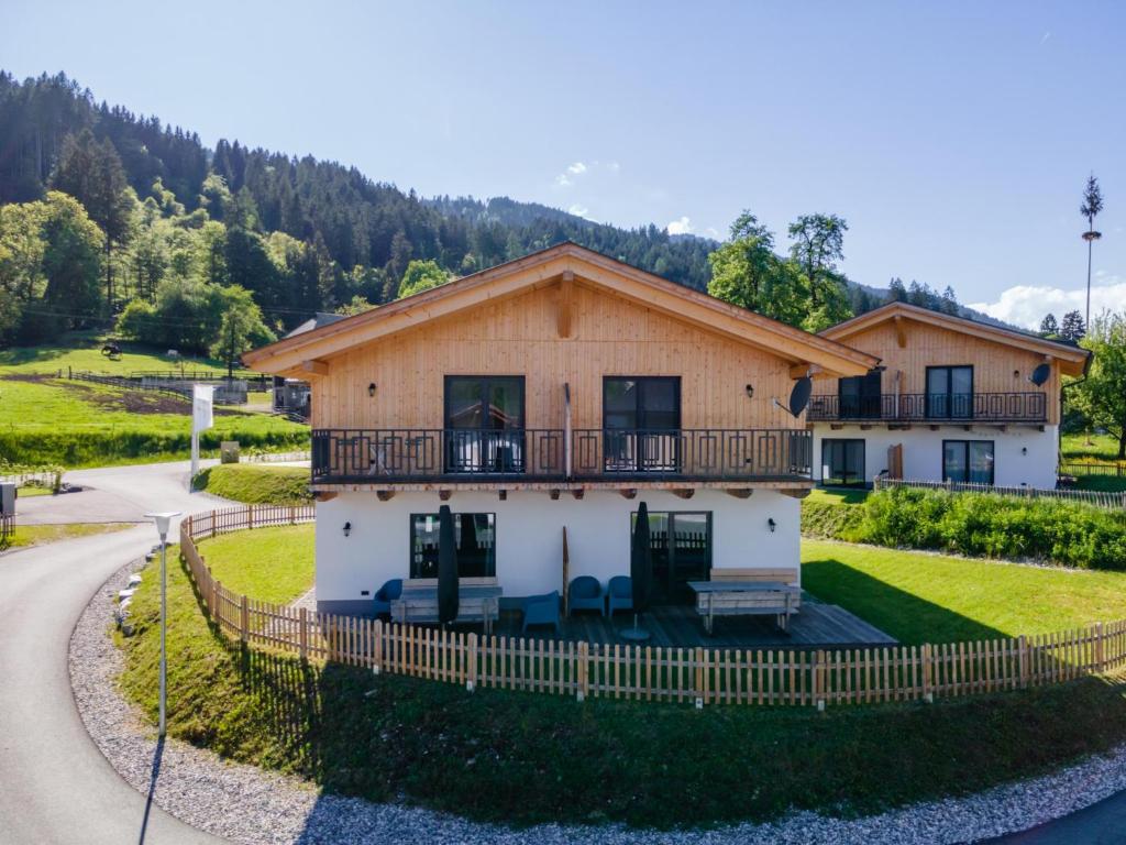a house with a fence around it at Obermöschach 6A in Obermöschach