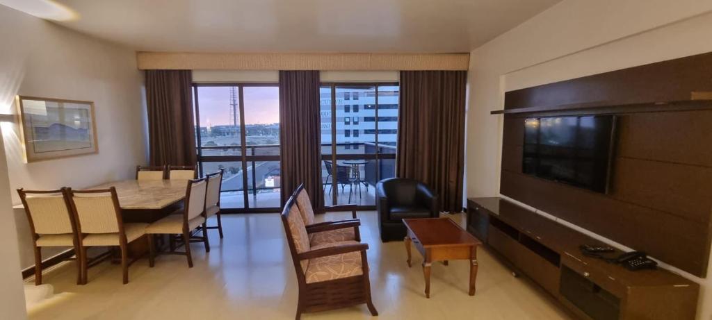 Télévision ou salle de divertissement dans l'établissement KUBITSCHEK - JK APART Hotel