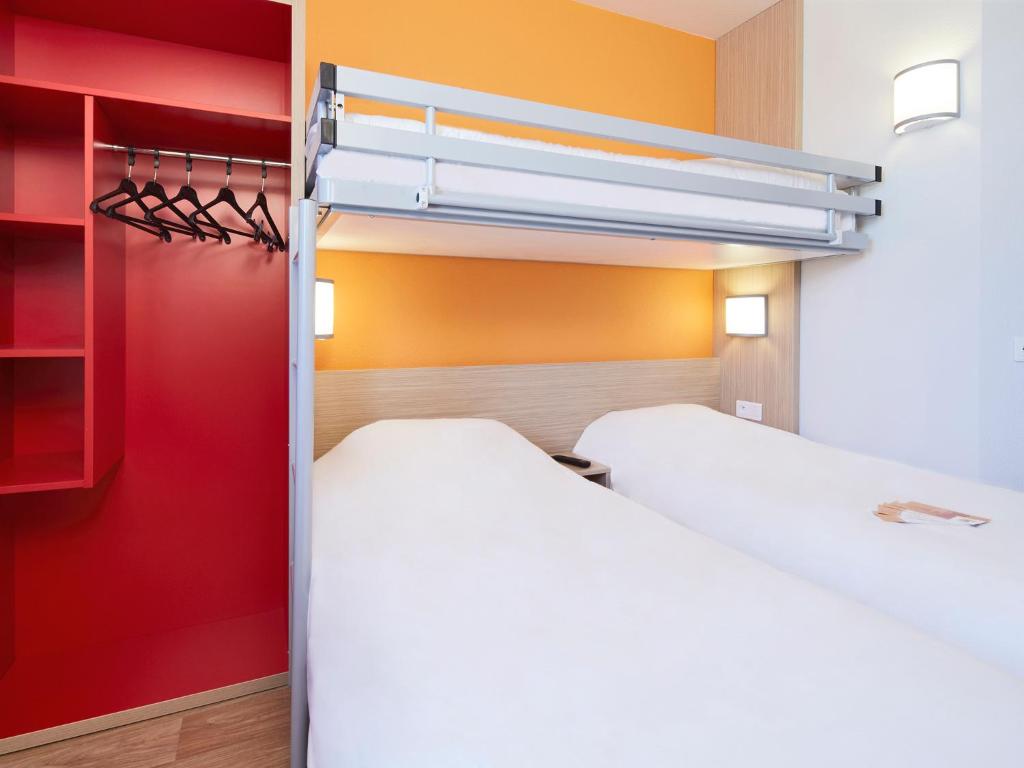 Postel nebo postele na pokoji v ubytování Premiere Classe Valence Nord - Saint Marcel Les Valence