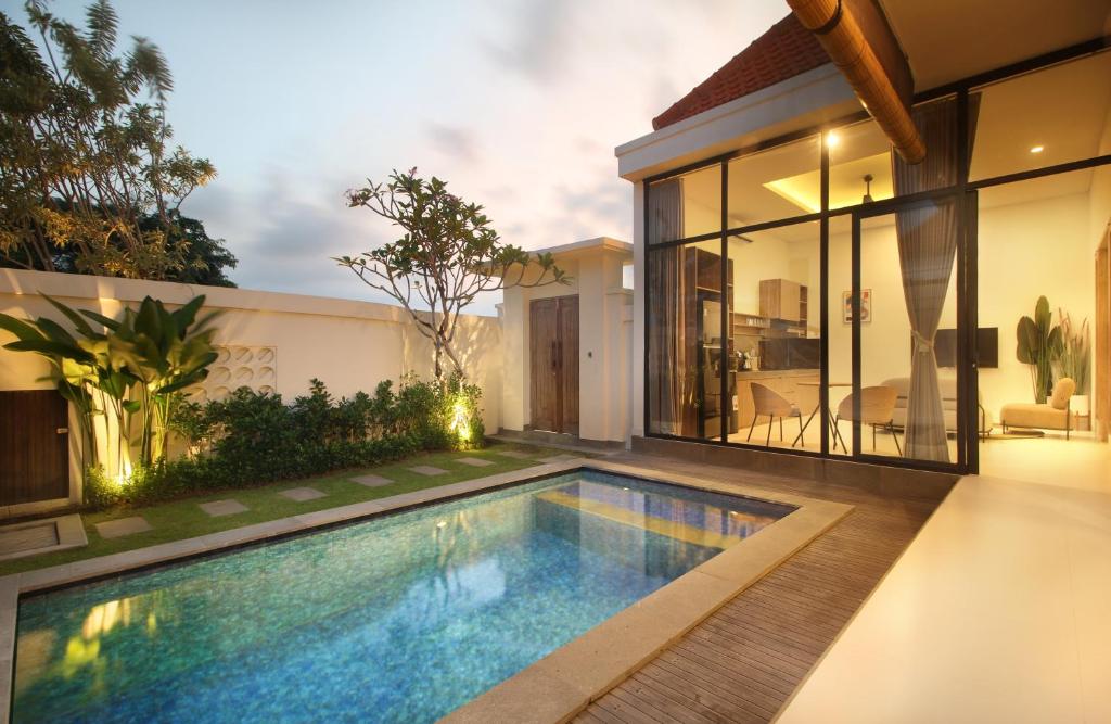 an image of a swimming pool in a house at Casa Vana Villas Bali byFaba in Munggu