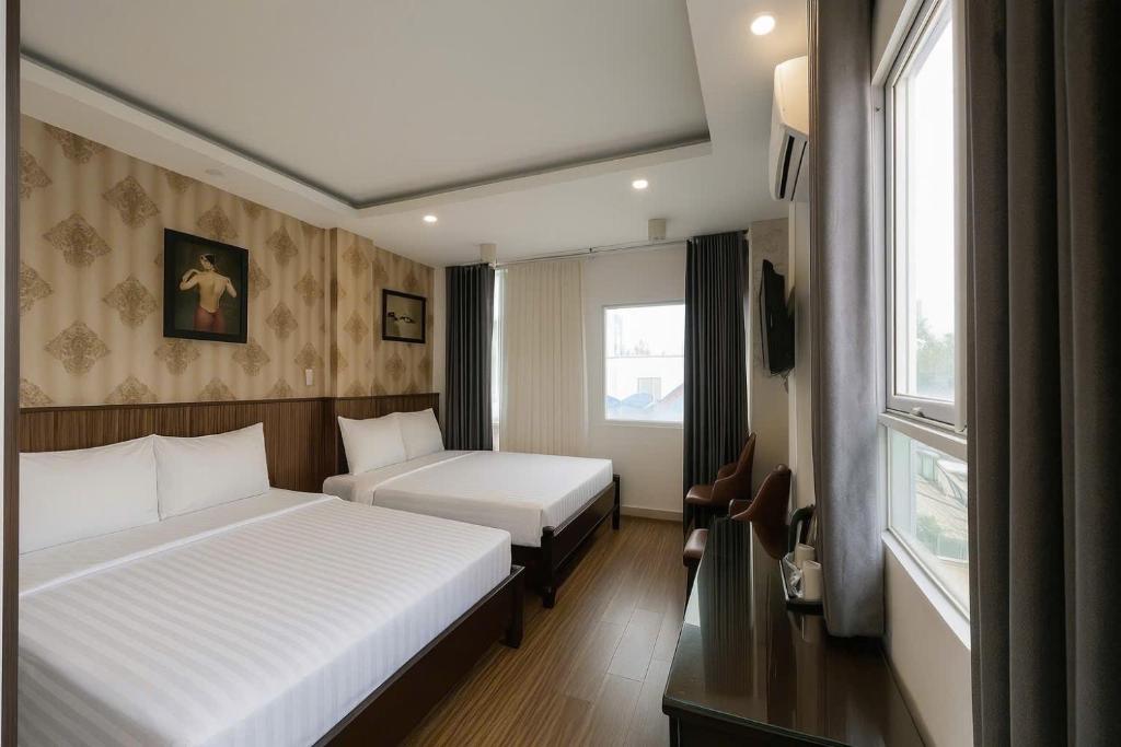 Ένα ή περισσότερα κρεβάτια σε δωμάτιο στο DDA Boutique hotel