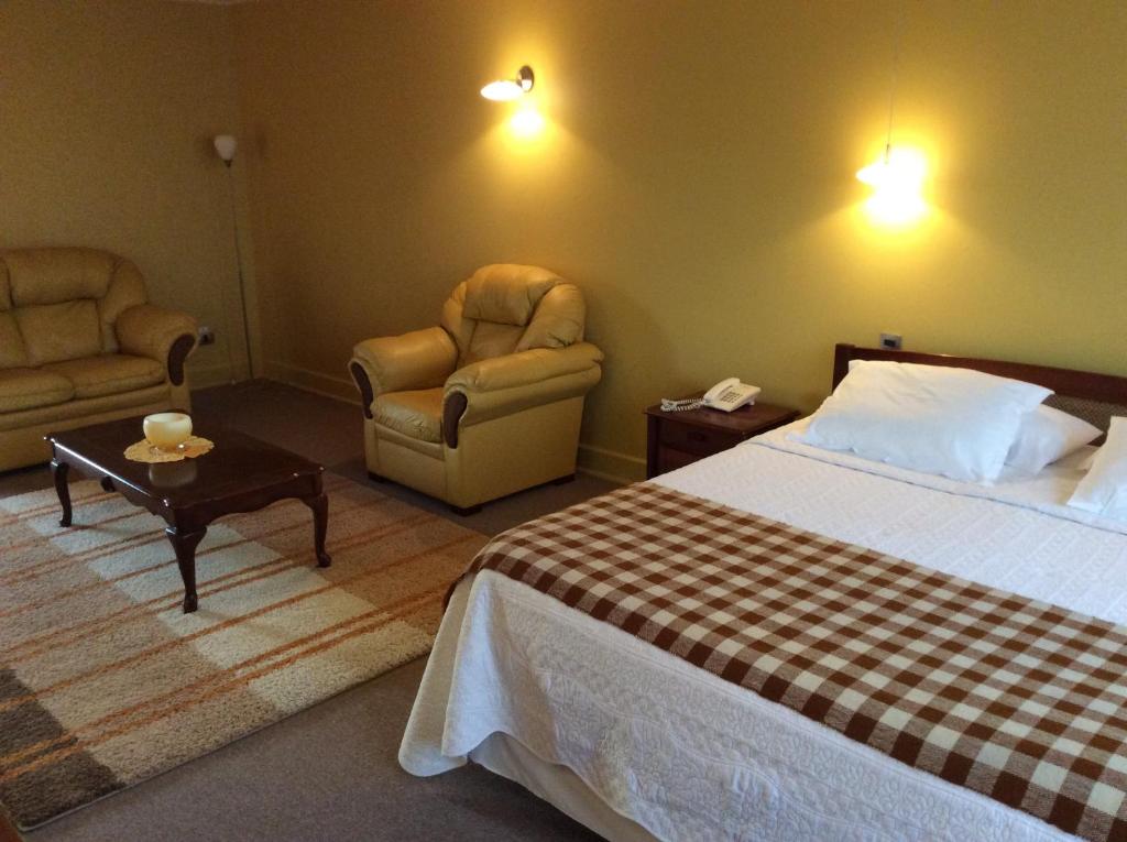 Postel nebo postele na pokoji v ubytování Hotel Patagonia Insular