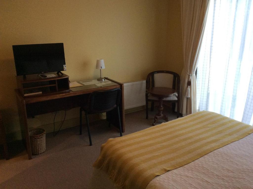 TV a/nebo společenská místnost v ubytování Hotel Patagonia Insular