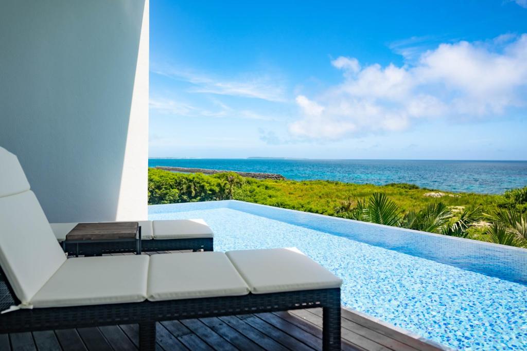a view of the ocean from a villa patio at soraniwa hotel and cafe in Miyako-jima