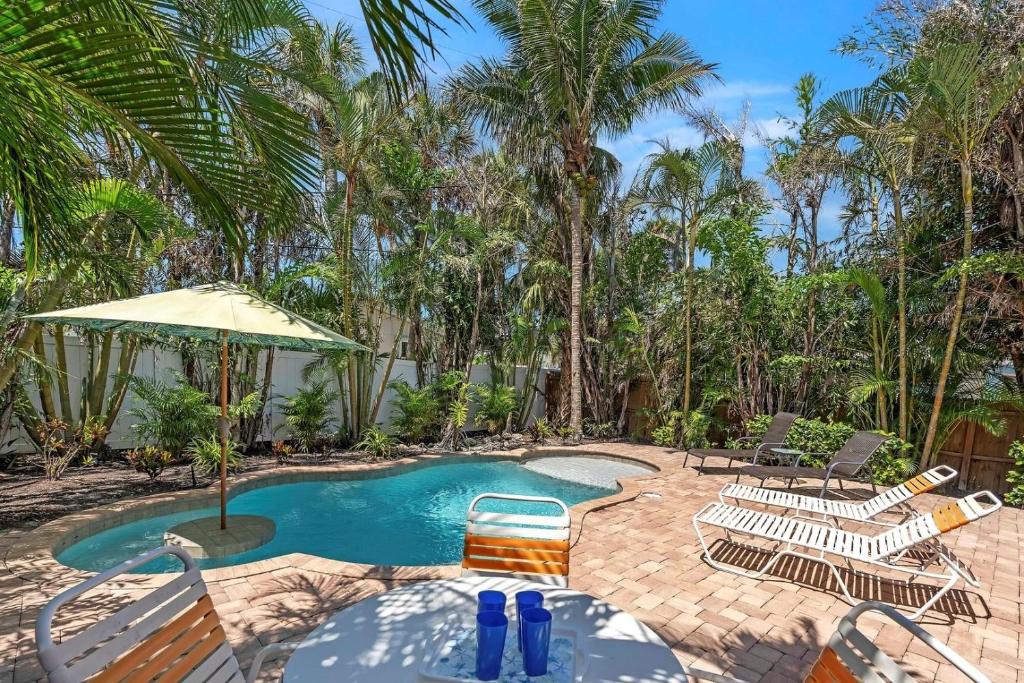 Swimmingpoolen hos eller tæt på Peacock Way bungalow