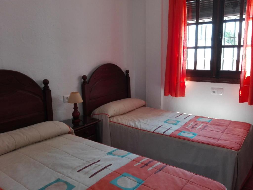Postel nebo postele na pokoji v ubytování Casa Dominga