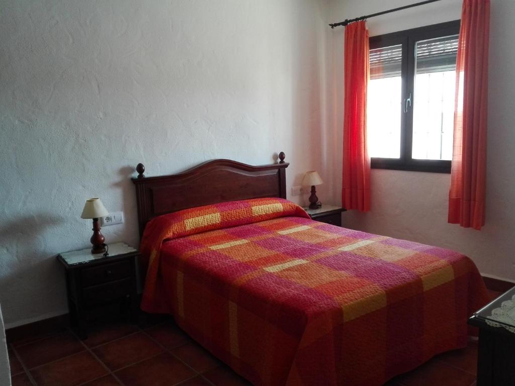 Postel nebo postele na pokoji v ubytování Casa Dominga