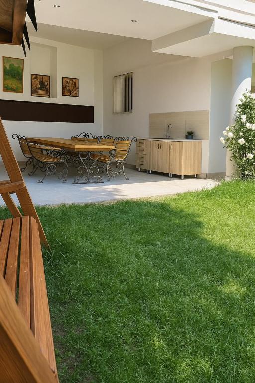 Zahrada ubytování TAGANI Guest House