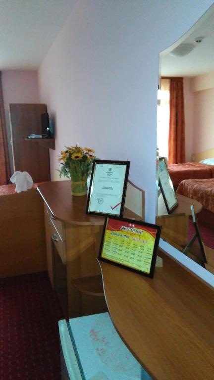 A bed or beds in a room at Guest House Aristokrat