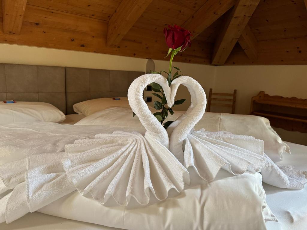 Postel nebo postele na pokoji v ubytování Hotel Savoia