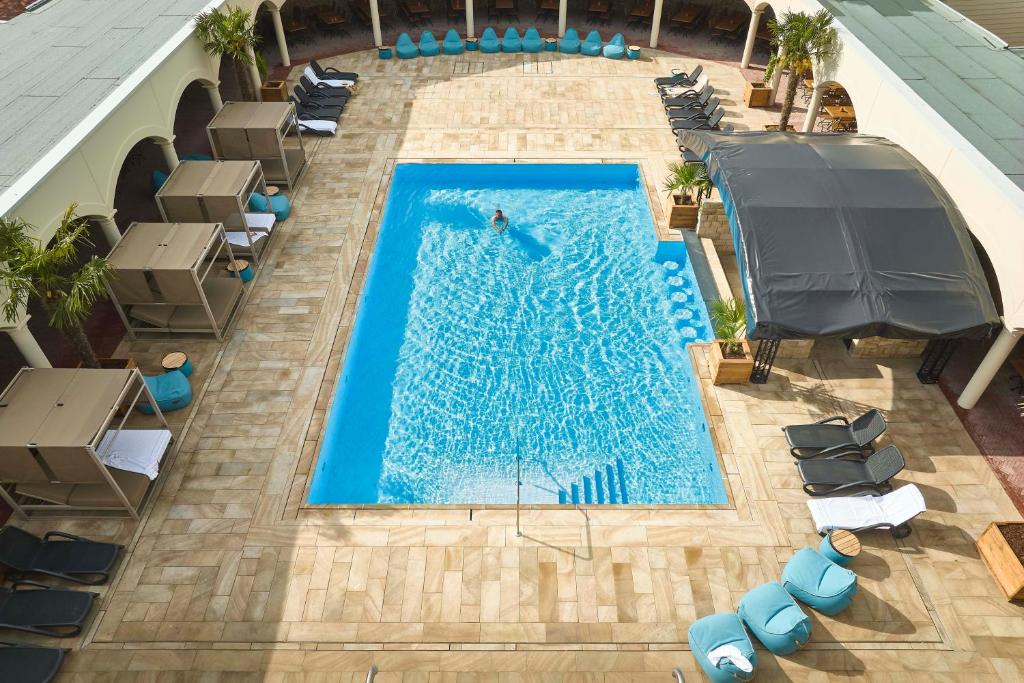 Bazén v ubytování Wangerland Resort nebo v jeho okolí