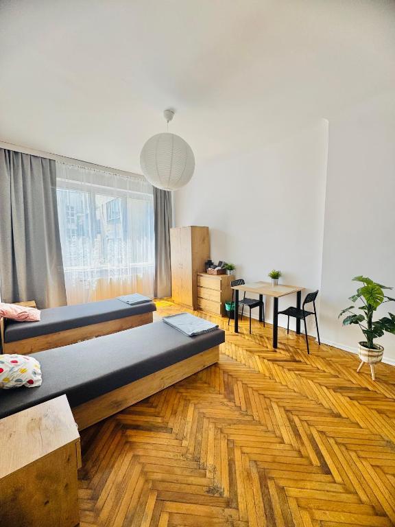 Postel nebo postele na pokoji v ubytování Apartament Symphonia self check in 24h