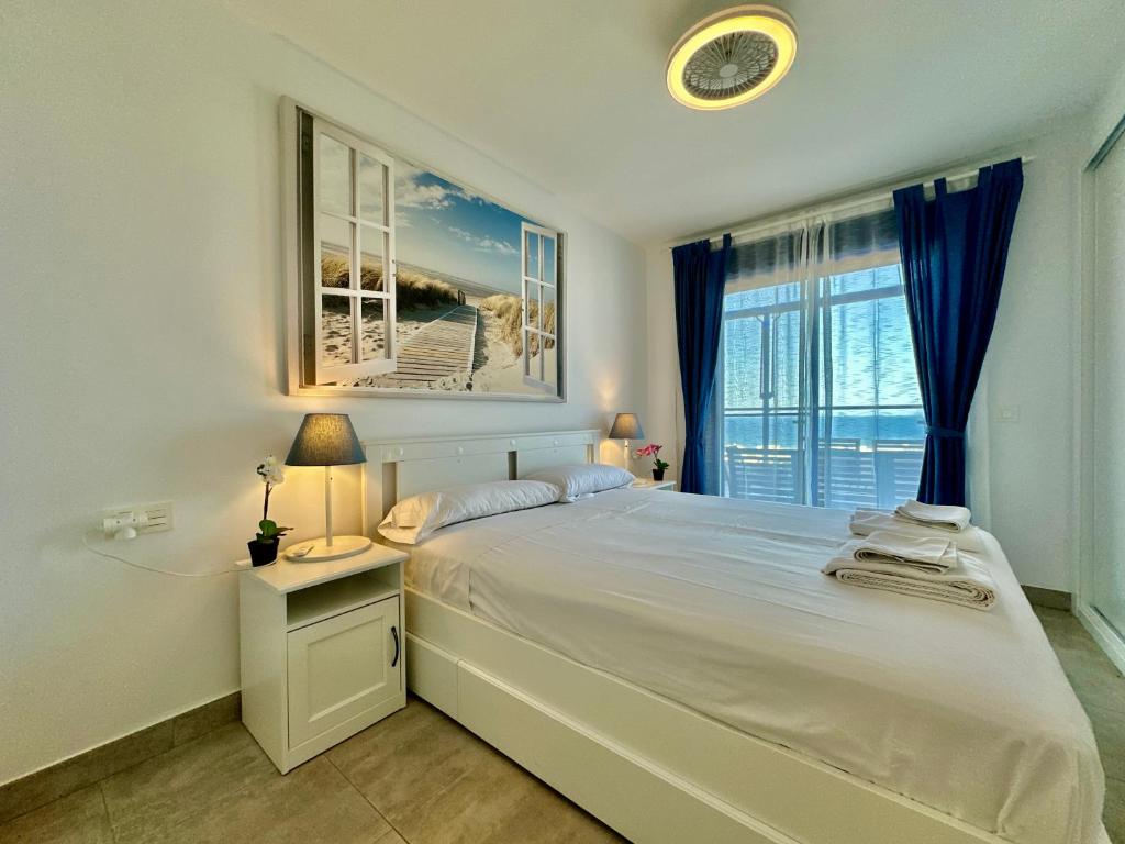 Posteľ alebo postele v izbe v ubytovaní Panoramic Atalaya
