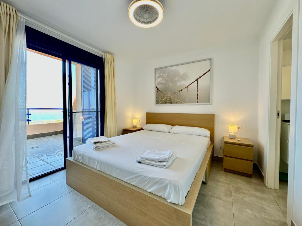 Posteľ alebo postele v izbe v ubytovaní Panoramic Atalaya