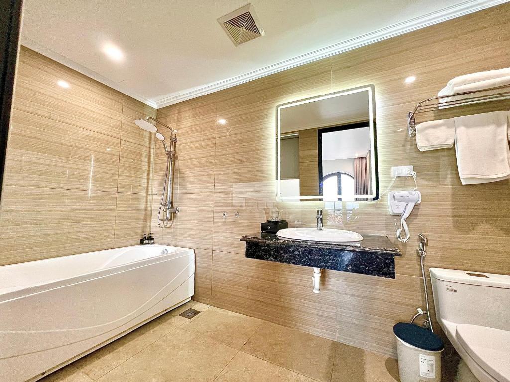 Koupelna v ubytování Grand Dragon Noi Bai Hotel