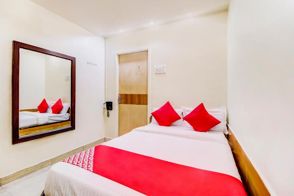 Postel nebo postele na pokoji v ubytování OYO Hotel Dreamland