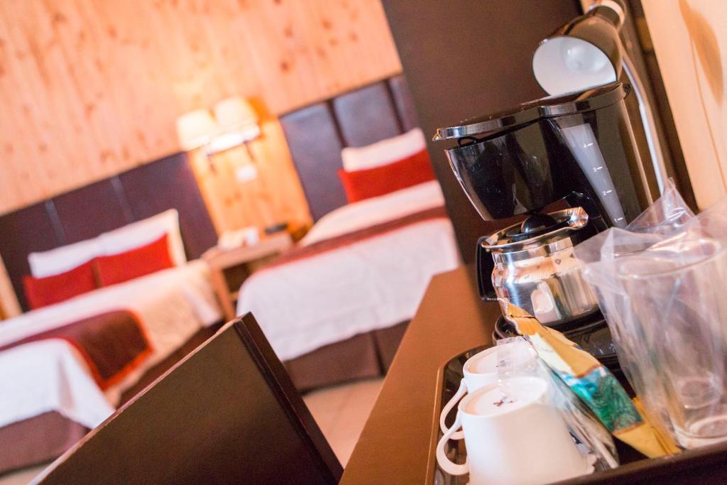 Postel nebo postele na pokoji v ubytování Hotel Savegre