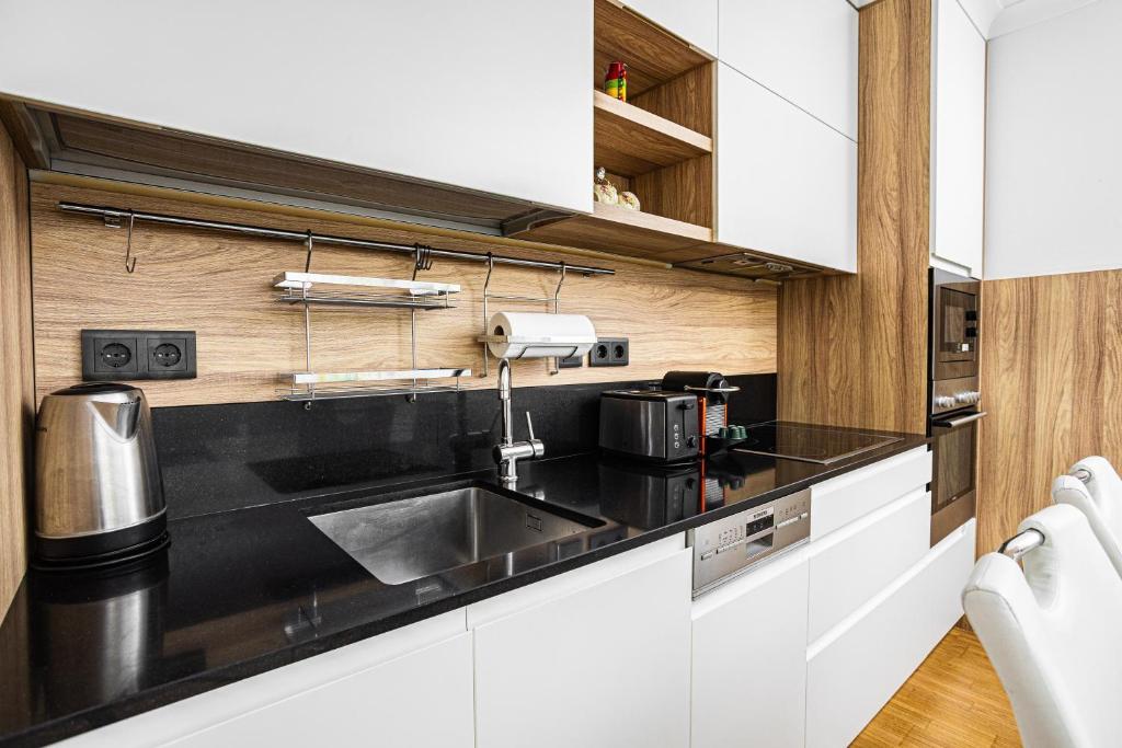 Kuchyň nebo kuchyňský kout v ubytování Vienna Apartments Hauptbahnhof