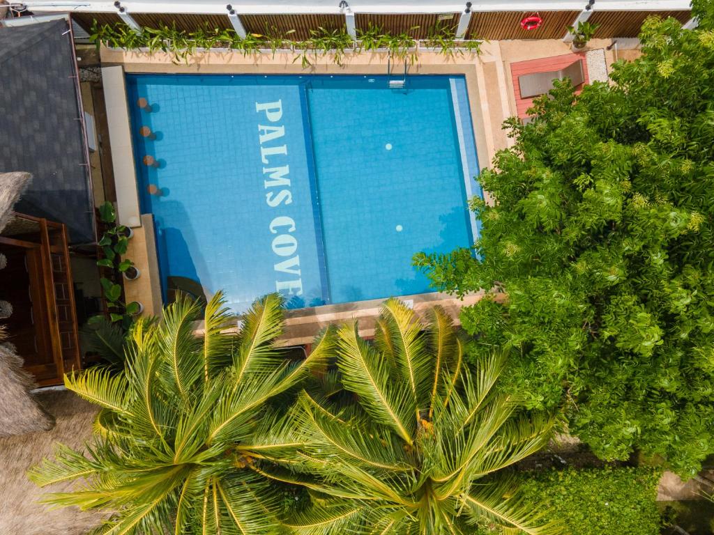 Bazén v ubytování Palms Cove Resort nebo v jeho okolí