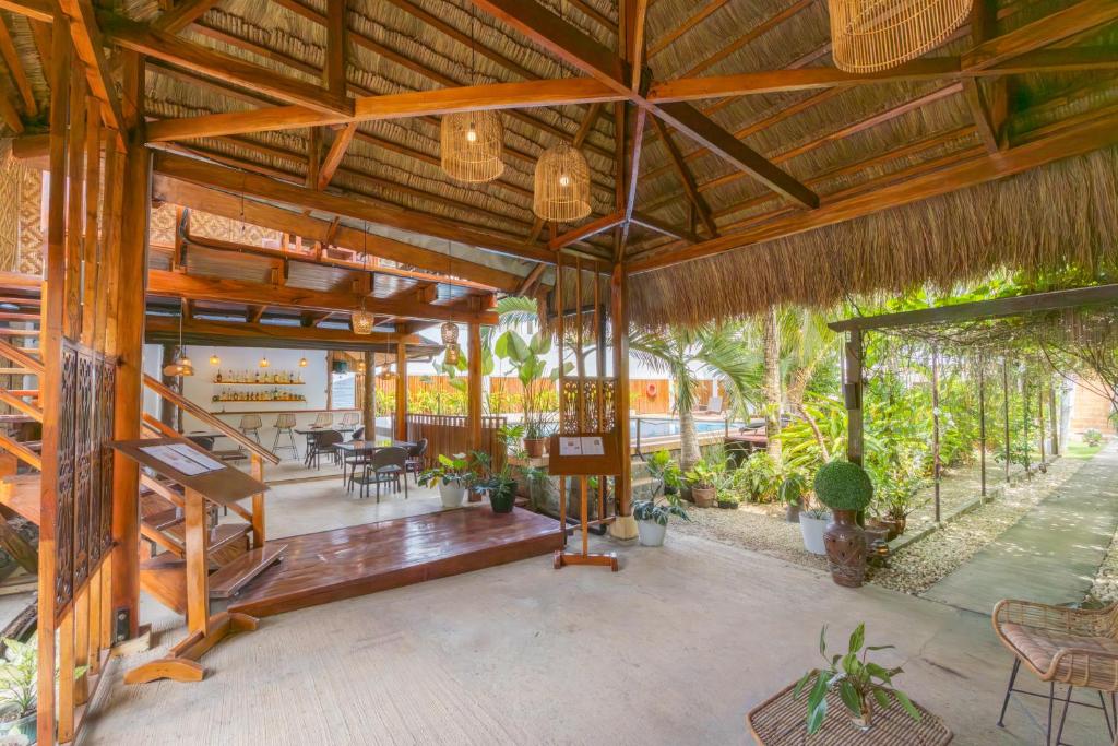 Zahrada ubytování Palms Cove Resort