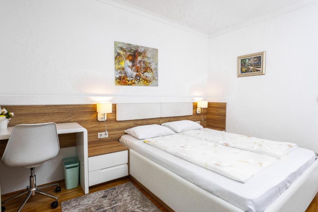 Postel nebo postele na pokoji v ubytování Vienna Apartments Hauptbahnhof