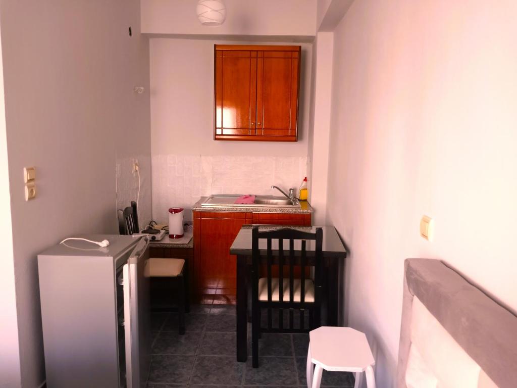 Kuchyň nebo kuchyňský kout v ubytování Ida Apartments