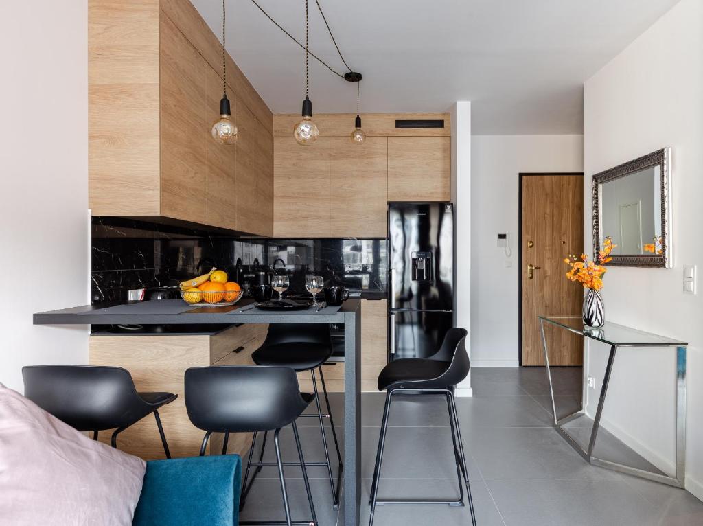 Kuchyňa alebo kuchynka v ubytovaní Portowa Przystań by Comfort Apartments