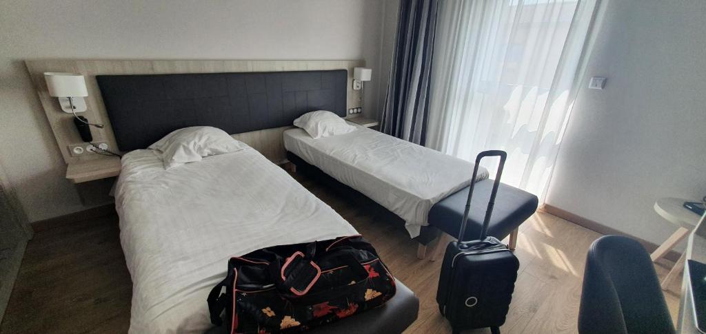 Postel nebo postele na pokoji v ubytování Berg'hotel