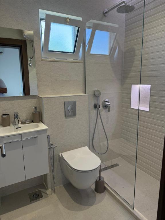 Koupelna v ubytování Casa Sinani