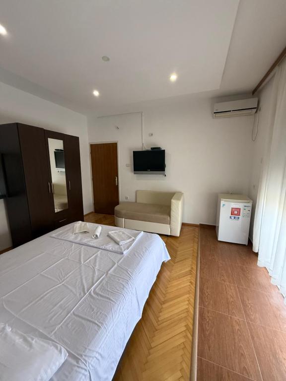 Postel nebo postele na pokoji v ubytování Casa Sinani