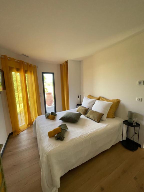 Ένα ή περισσότερα κρεβάτια σε δωμάτιο στο Villa 7