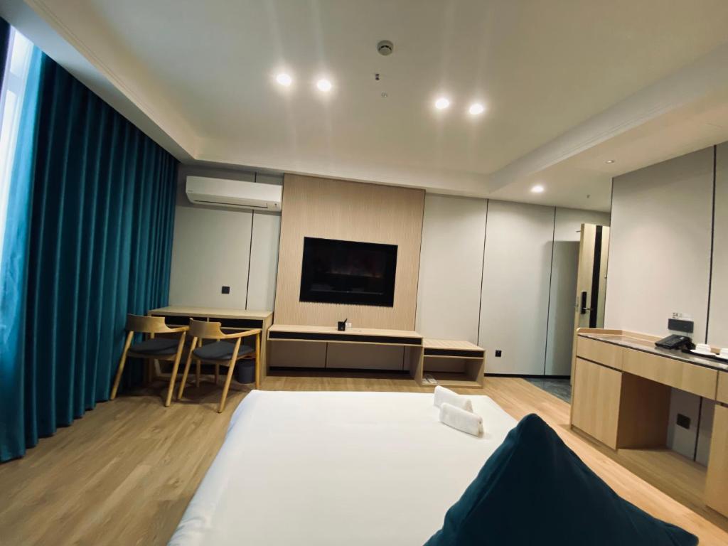 Kuchyň nebo kuchyňský kout v ubytování Fan's Hotel Palo