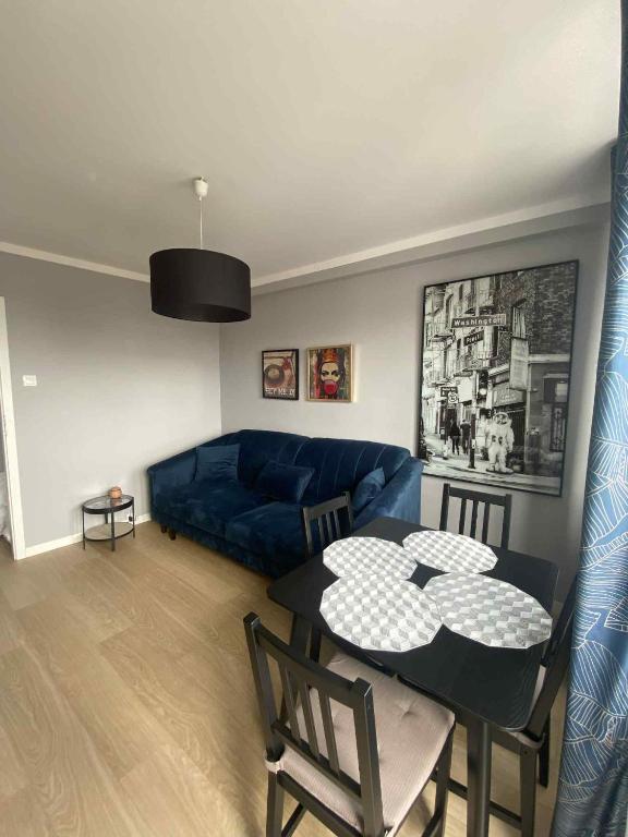 Posedenie v ubytovaní Apartament Długie Ogrody
