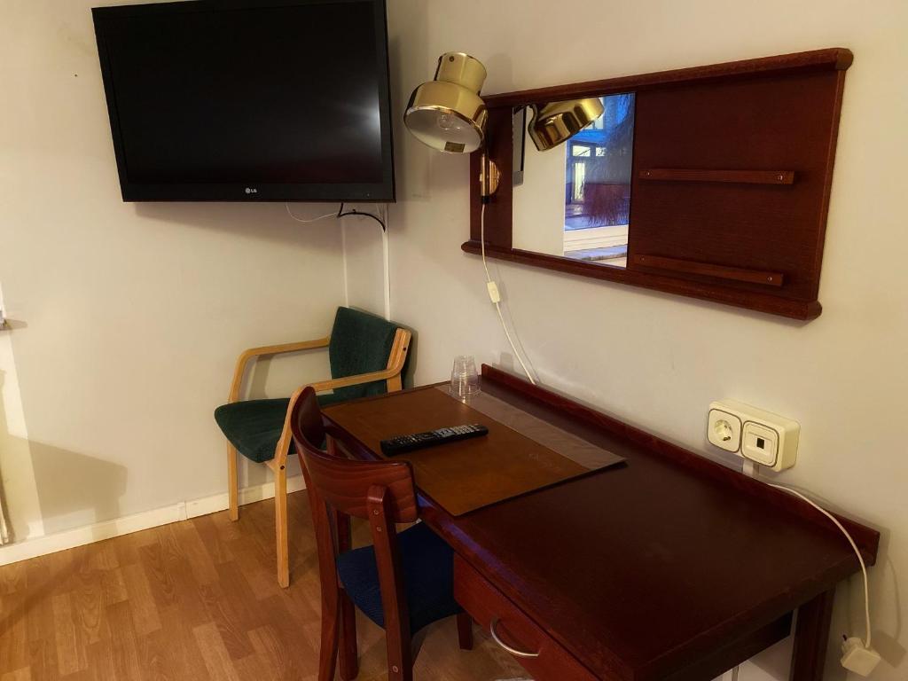 TV a/nebo společenská místnost v ubytování Hotel Örgryte