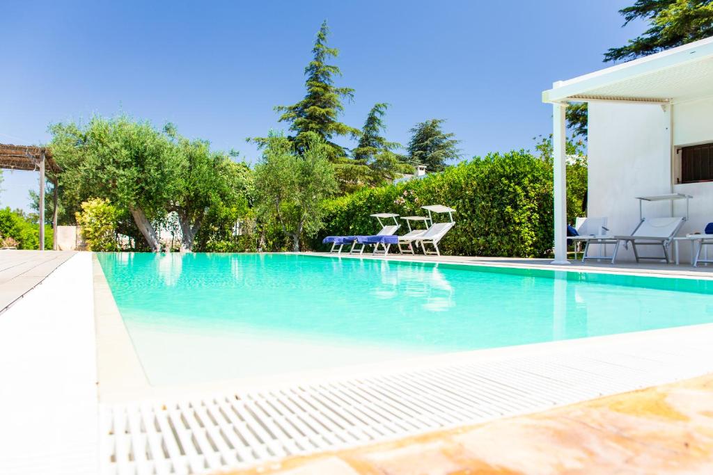 Πισίνα στο ή κοντά στο Trulli del Capo by MONHOLIDAY