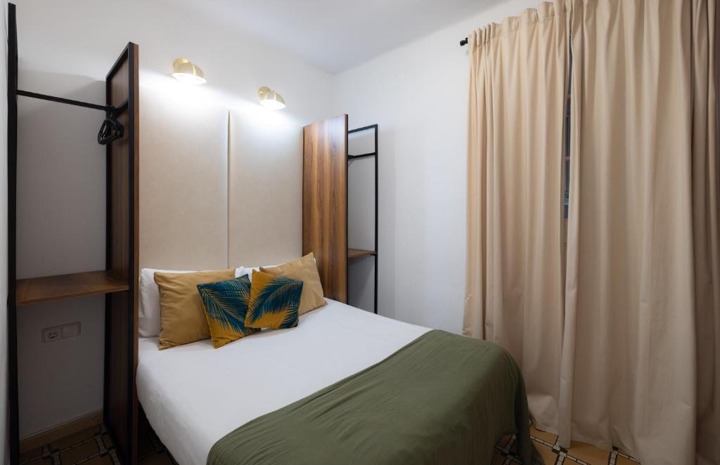 Postel nebo postele na pokoji v ubytování Stay U-nique Apartments Floridablanca