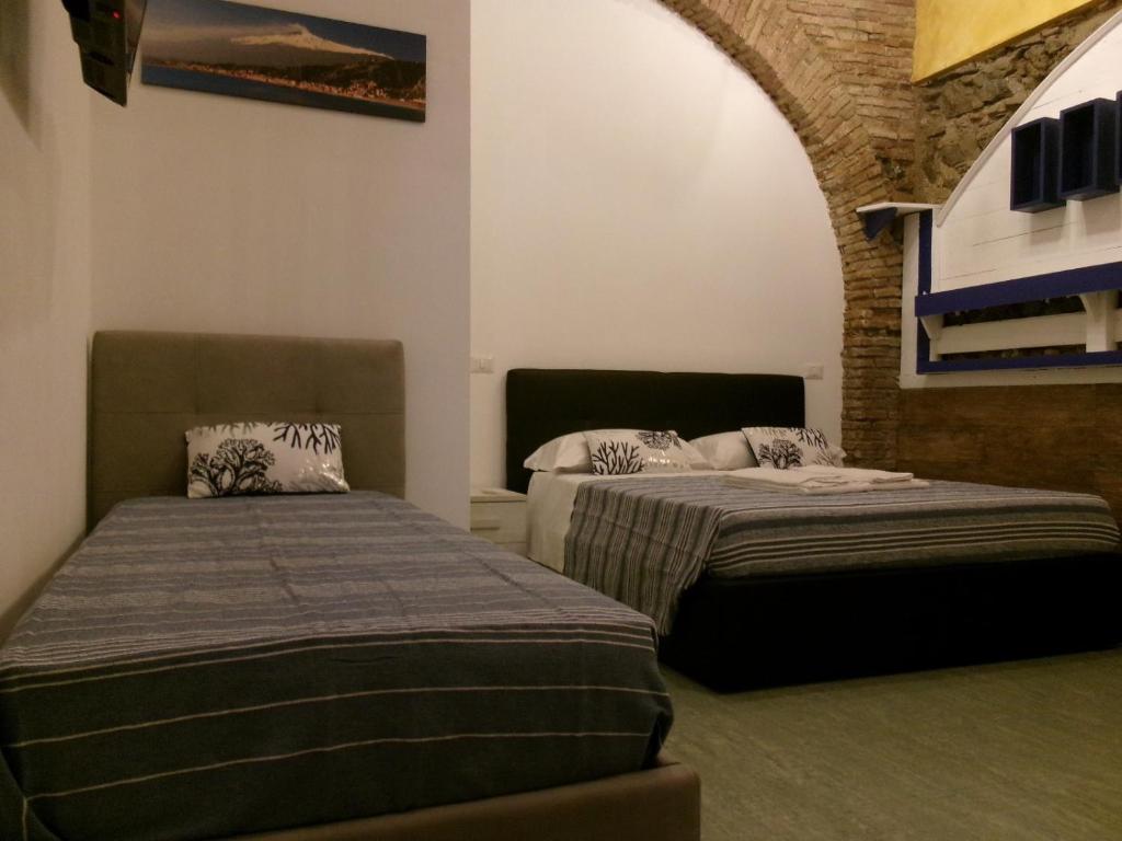 Postel nebo postele na pokoji v ubytování Marina Club