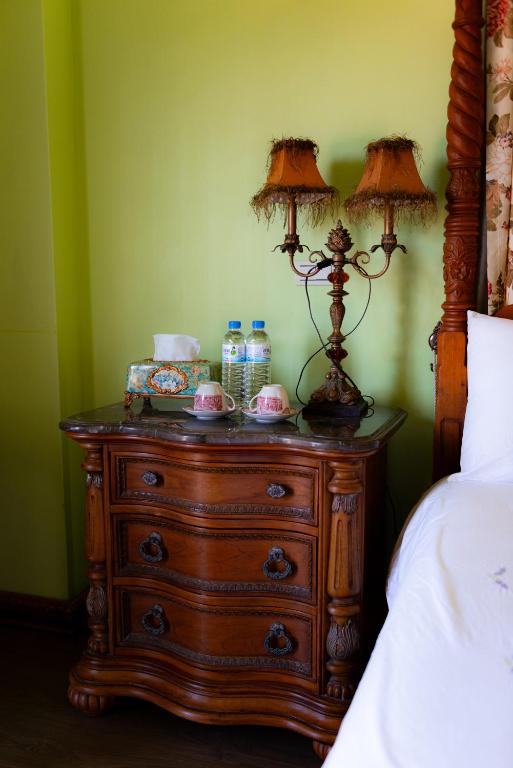 Ein Bett oder Betten in einem Zimmer der Unterkunft 英格蘭小古堡England Castle