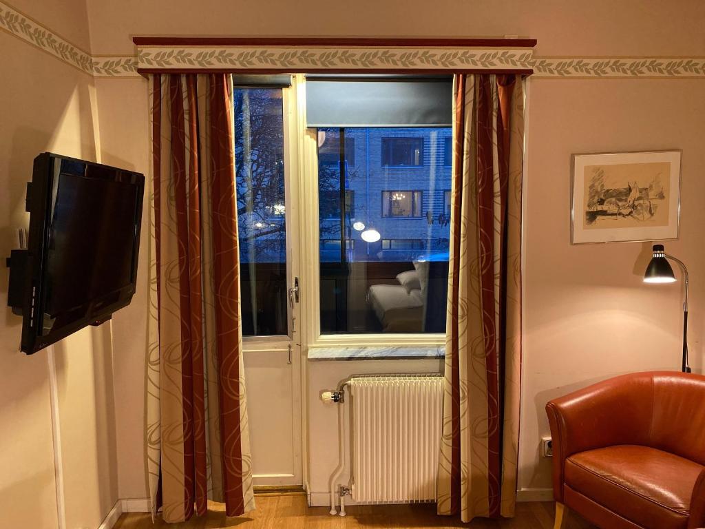 TV a/nebo společenská místnost v ubytování Hotel Örgryte