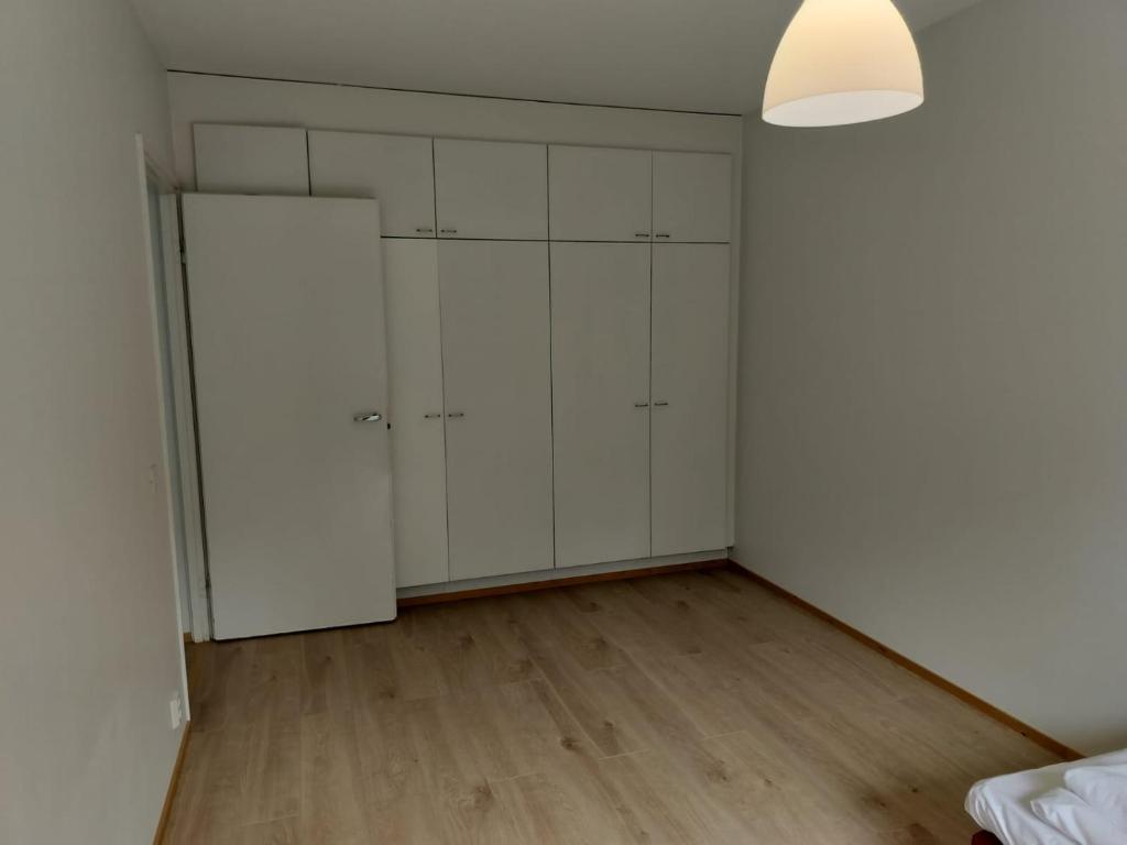 Postel nebo postele na pokoji v ubytování Kotimaailma Apartments Lohja - 2BR apartment