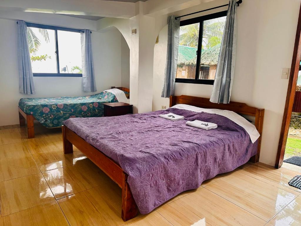 Postel nebo postele na pokoji v ubytování Rio Beach Resort