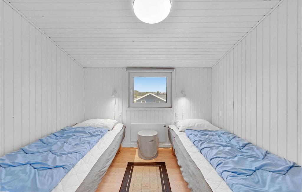 Postel nebo postele na pokoji v ubytování Holiday Home Bjerregårdsvej Hvide Sande Ds Denm