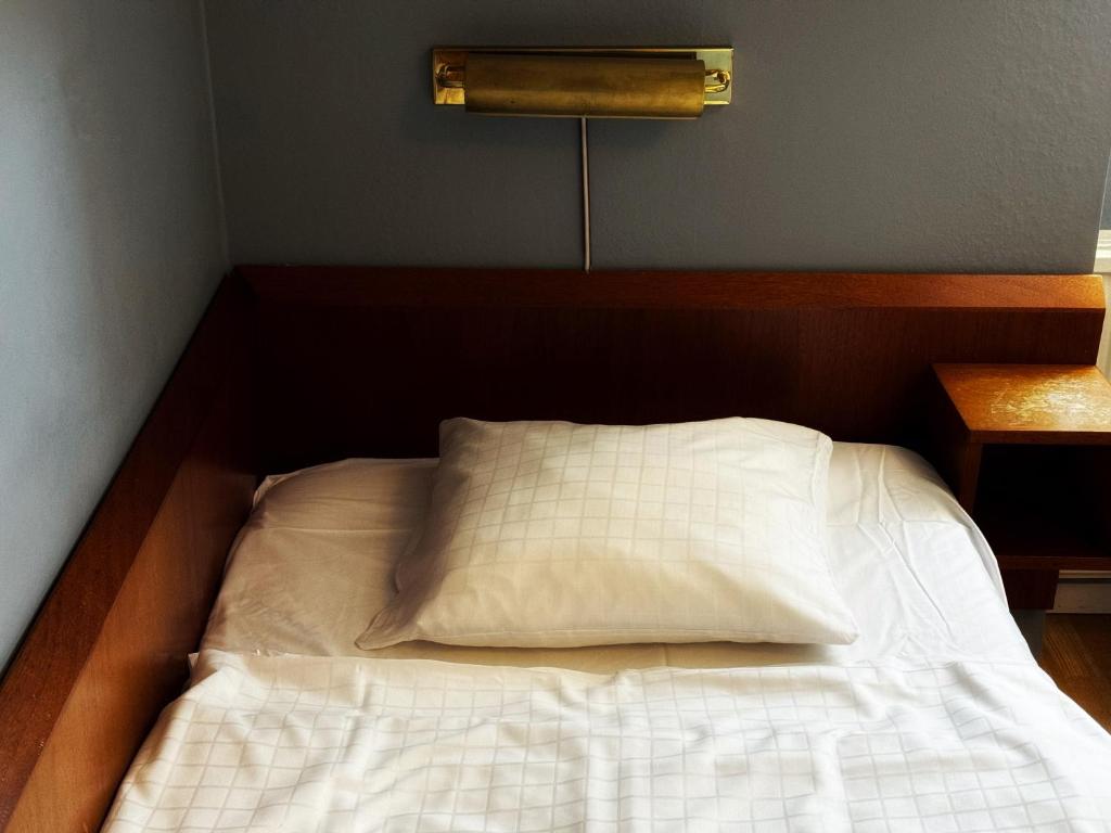 Postel nebo postele na pokoji v ubytování Hotel Örgryte