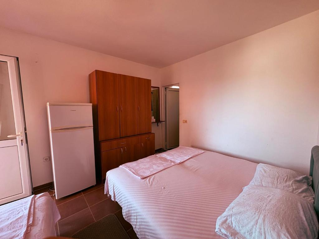 Letto o letti in una camera di Shkreli Apartments