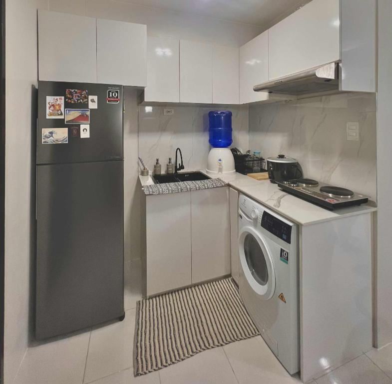 Kuchyň nebo kuchyňský kout v ubytování The Urban Apartment Fairy